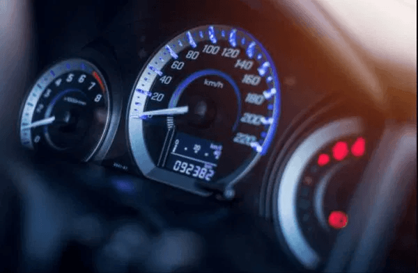 Close-up of a car odometer reading 92,382 miles, illustrating high-mileage vehicle diminished value claims in NC and SC